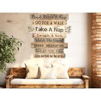 A rustic extra large lake house rule wall hanging. personalized lake life rules are wood burned onto 12 reclaimed boards.